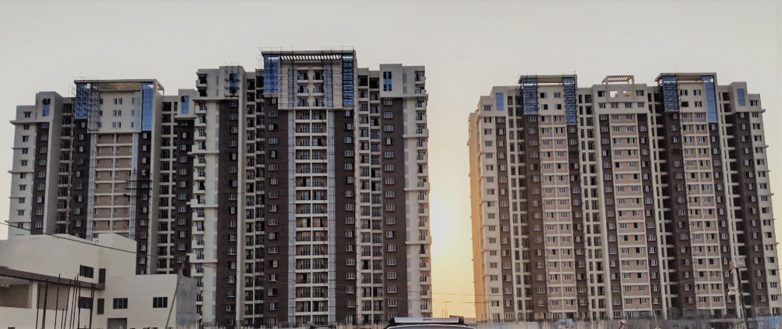 The towers of Doshi Risington at sunset
